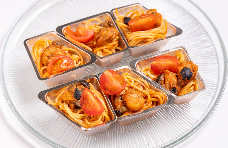 〆にはベビーホタテのプッタネスカ